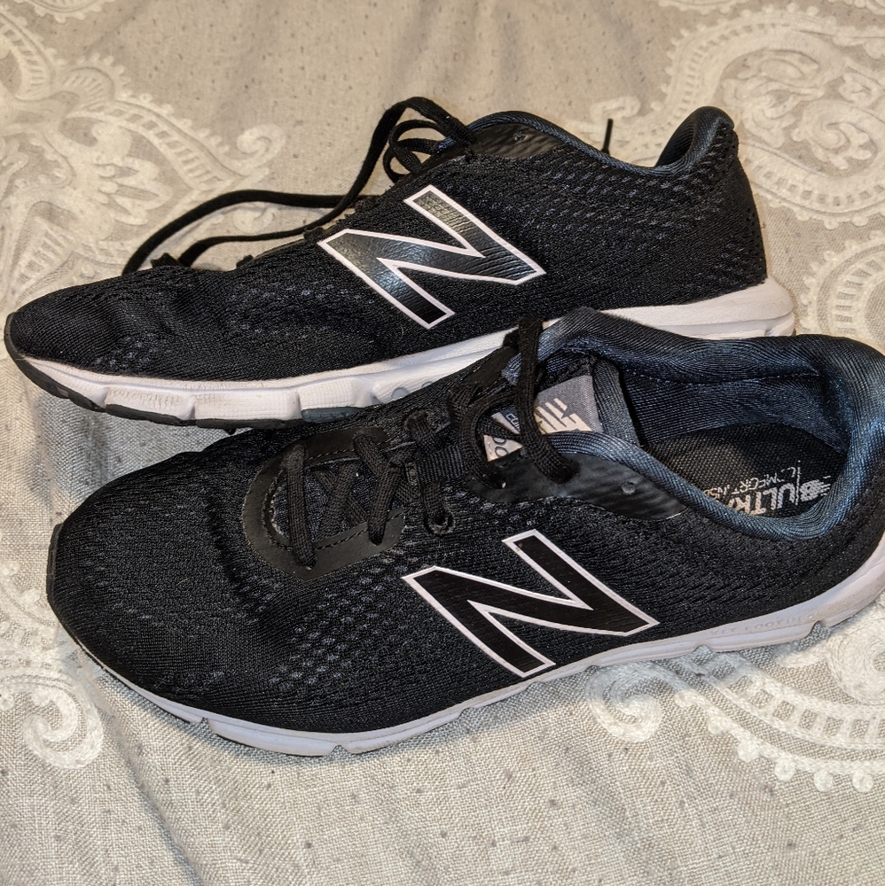 Black New Balance sneakers
